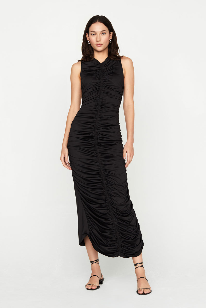 Form fitting sleeveless solid black ruched midi length dress 