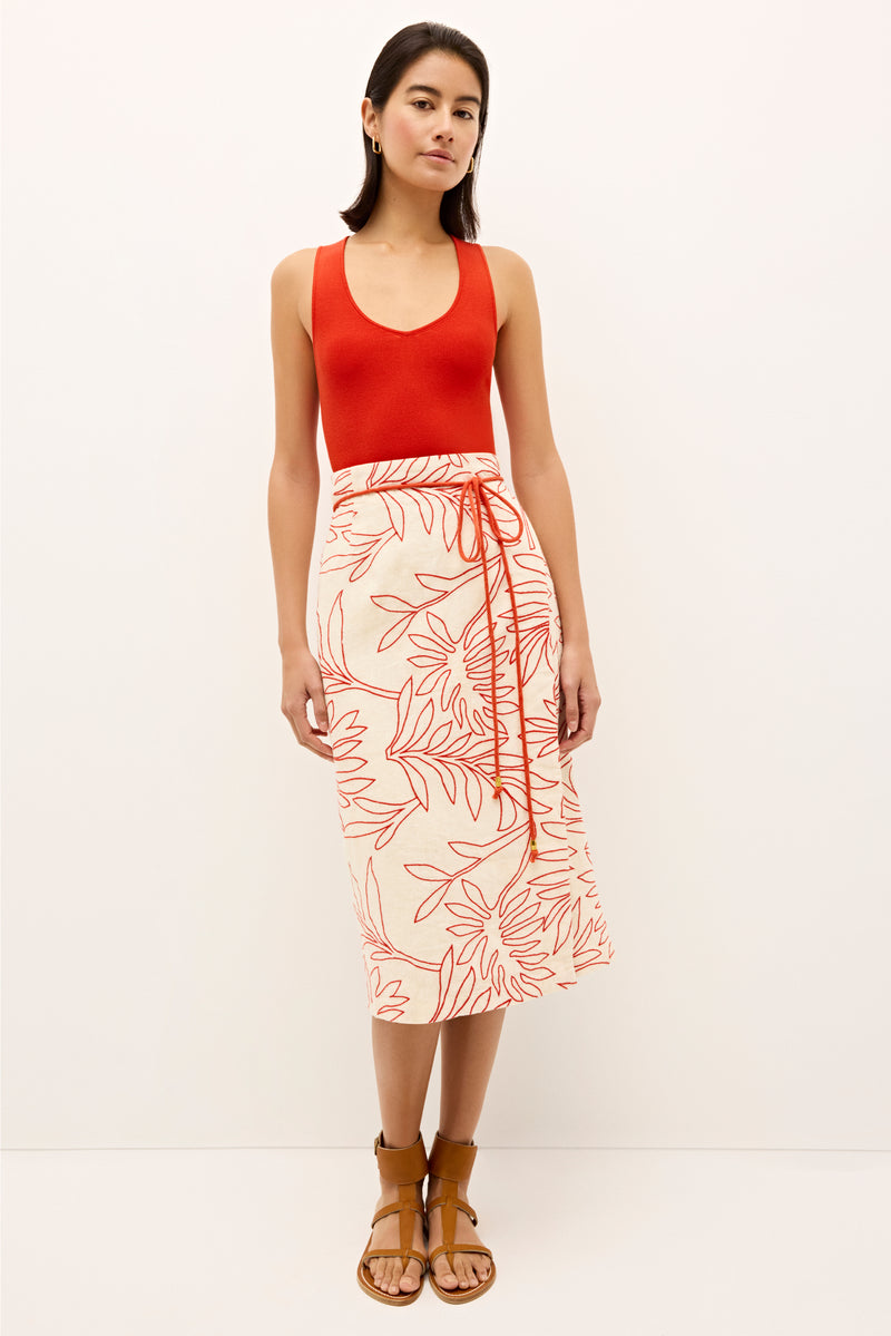 Natural toned pencil skirt with vibrant red foliage stitching