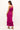 Bright pink bodycon midi skirt with vertical ribbing and layered ribbed hem 