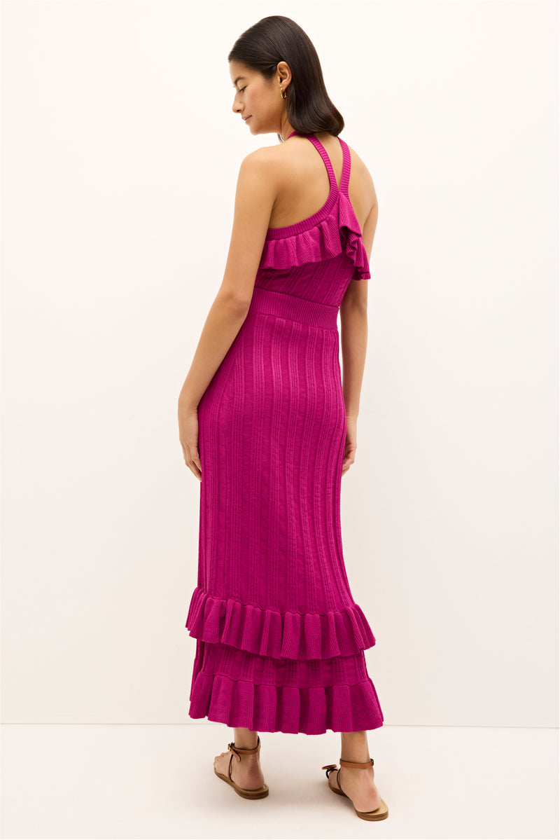 Bright pink bodycon midi skirt with vertical ribbing and layered ribbed hem 