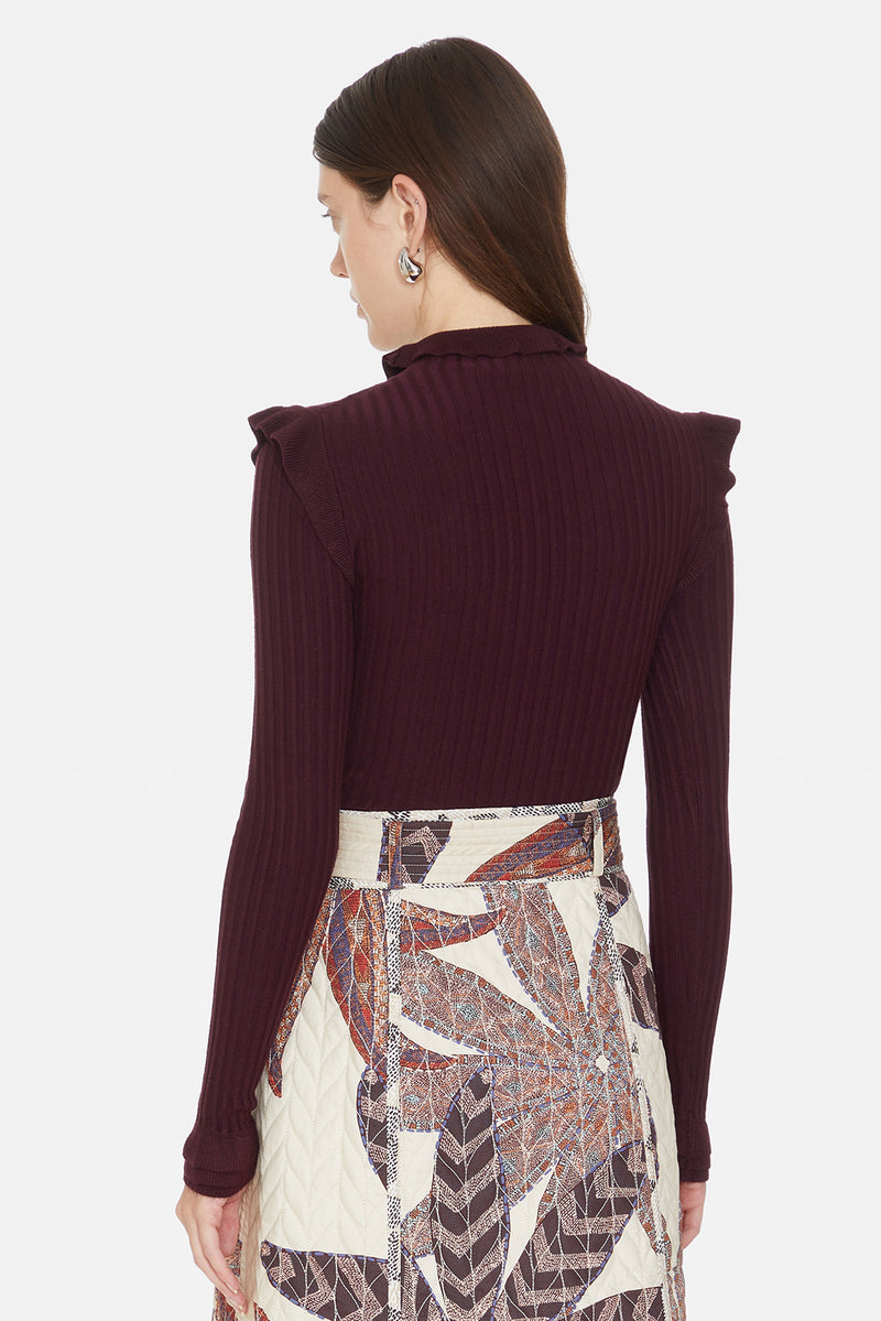 Ribbed sweater turtleneck with ruffles