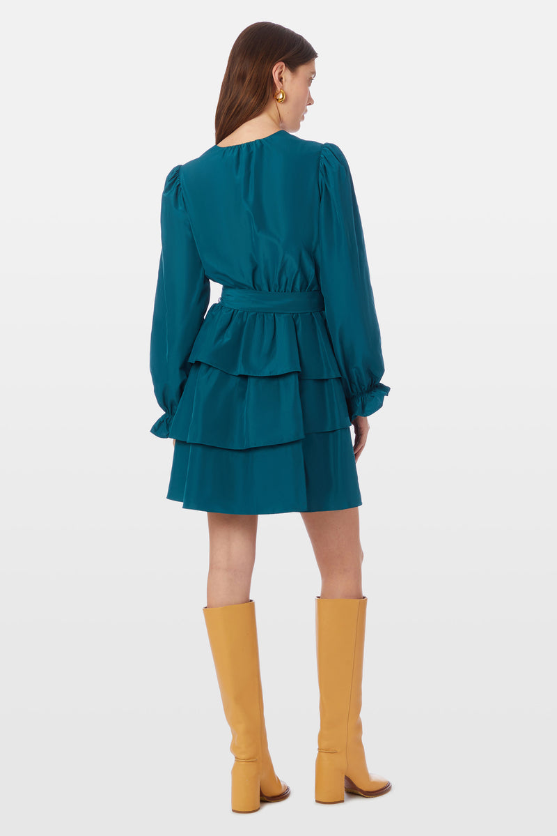 Long sleeve mini dress with v-neckline in a solid deep blue color 