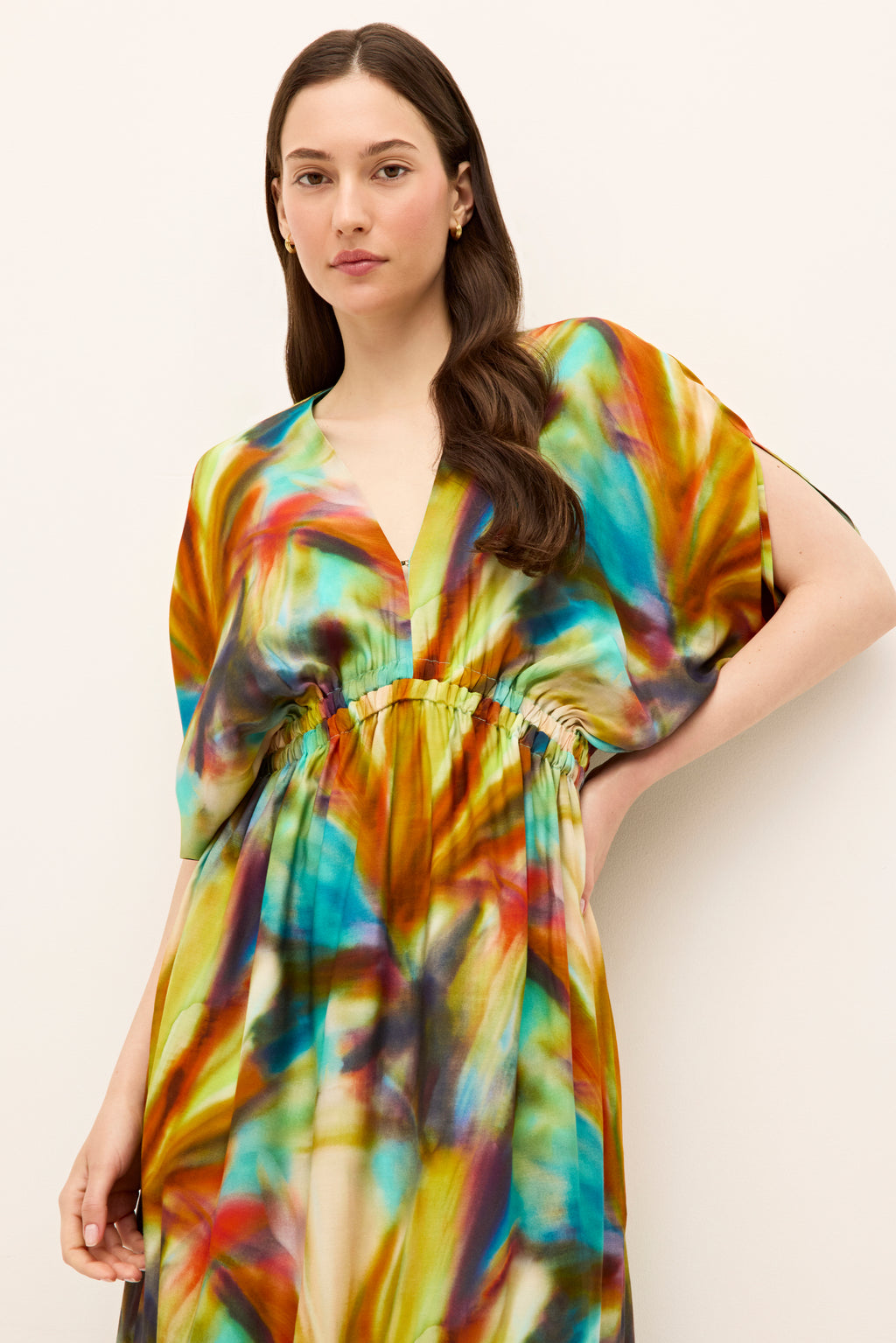 Shirt sleeve V-neck dress with a cinched waist and abstract tie-dye pattern 