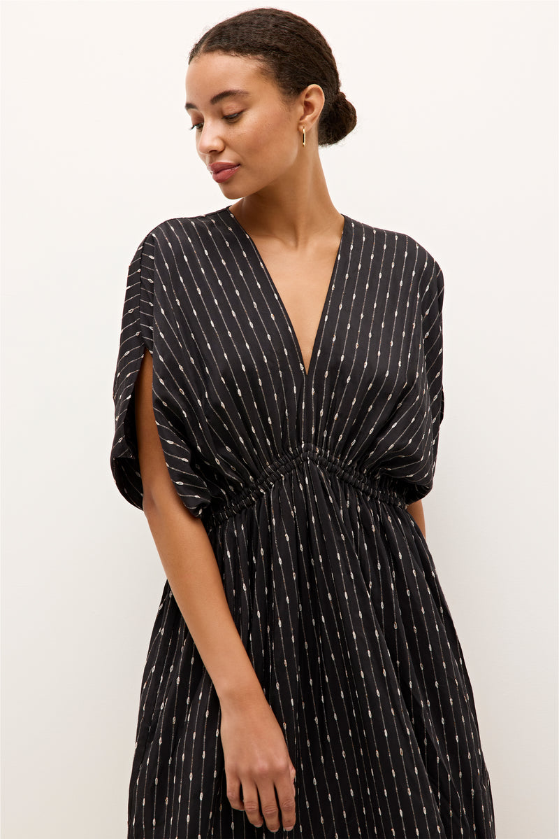Black cotton dress with subtle stripe pattern and a flattering ruched bodice 