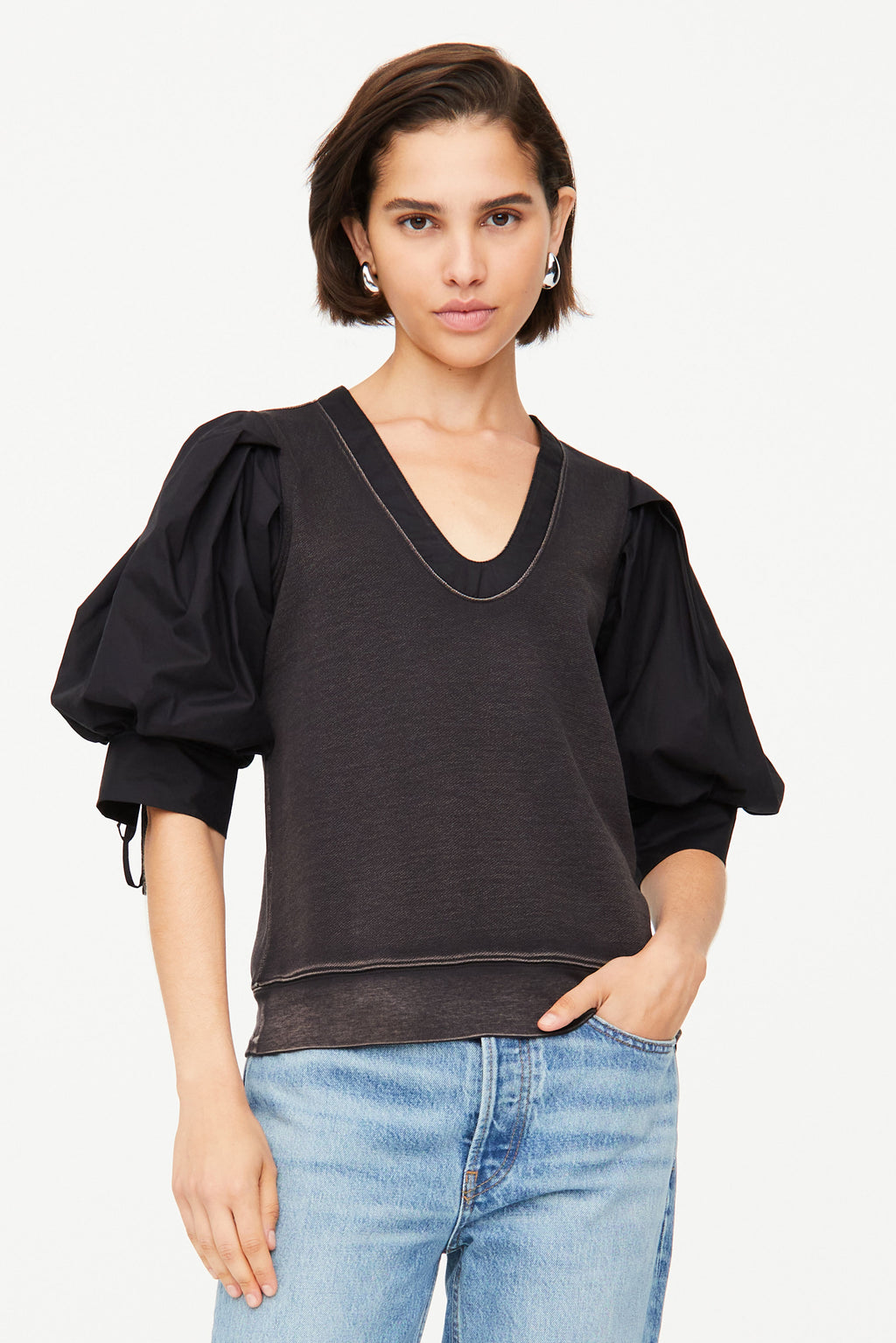 Black short sleeve top with a straight silhouette