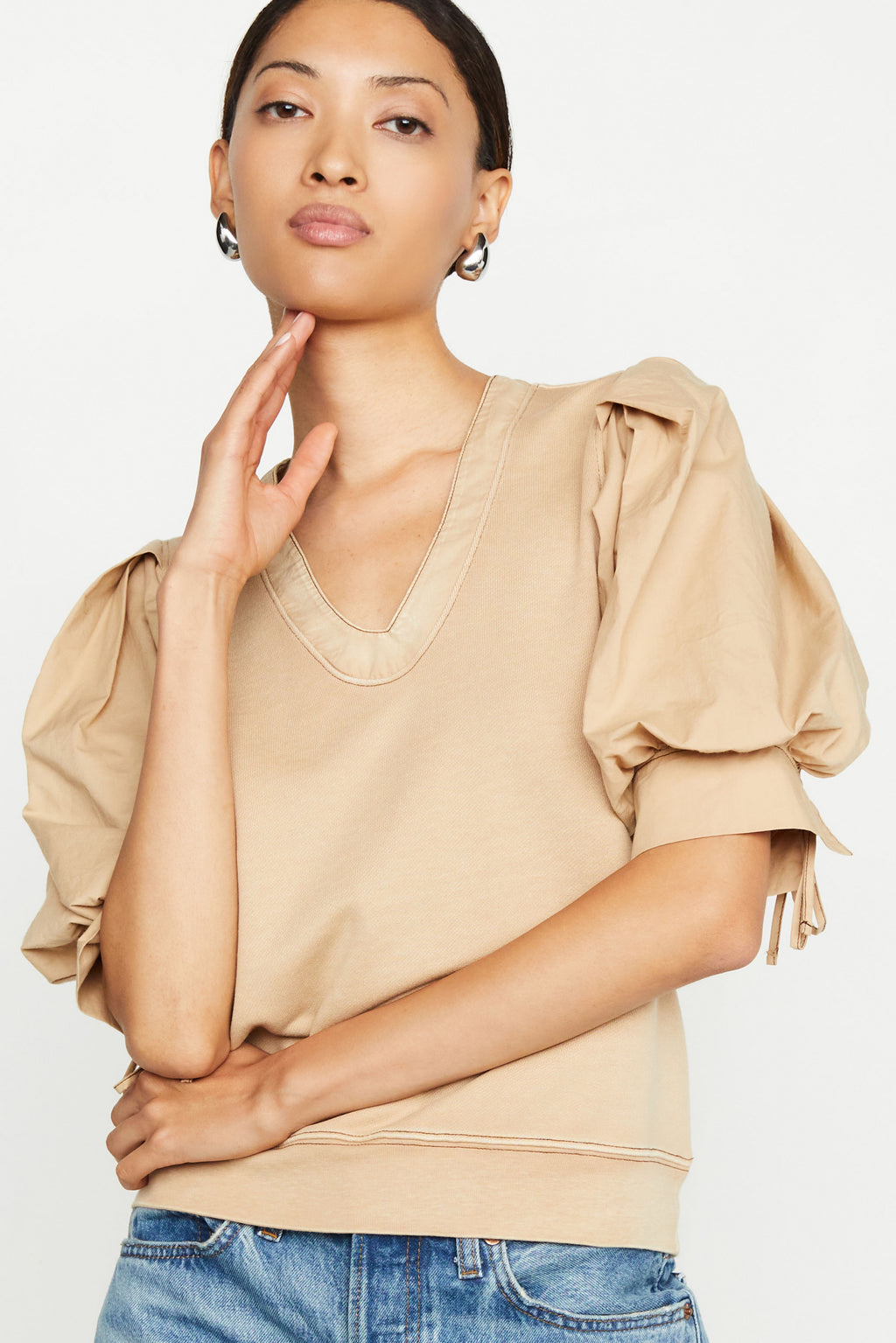 Beige short sleeve top with a straight silhouette