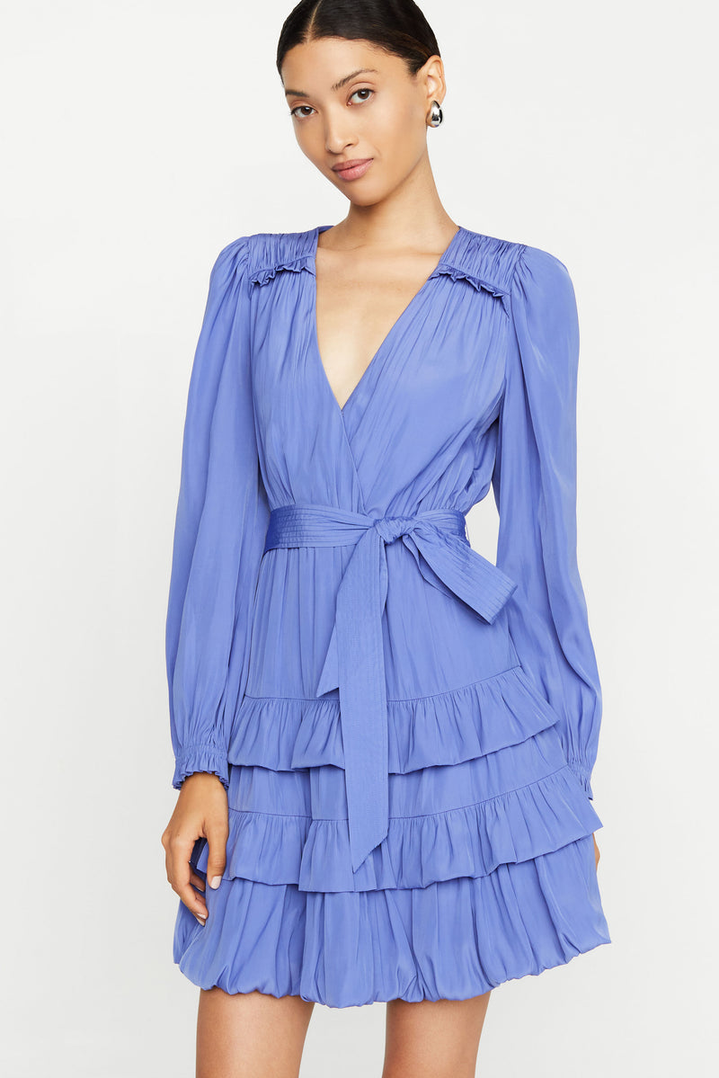 Bubble hem above the knee dress with long sleeves and ruffled details 