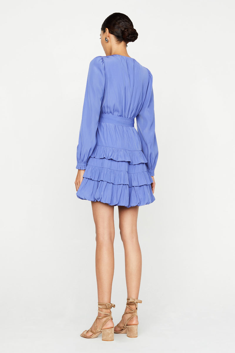 Fully lined short dress with long sleeves and bubble hem, crossover optional neck tie 