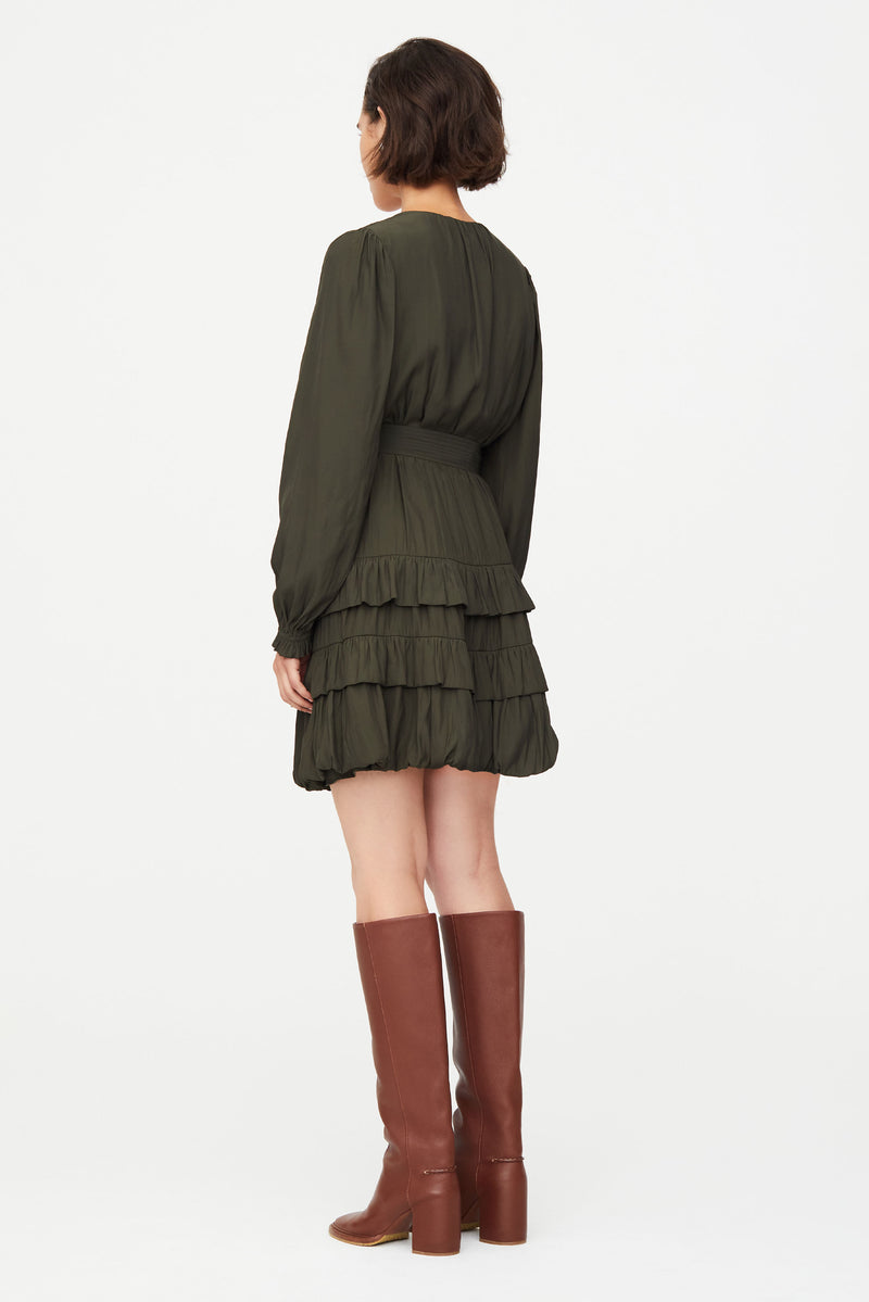 Fully lined short dress with long sleeves and bubble hem, crossover optional neck tie 