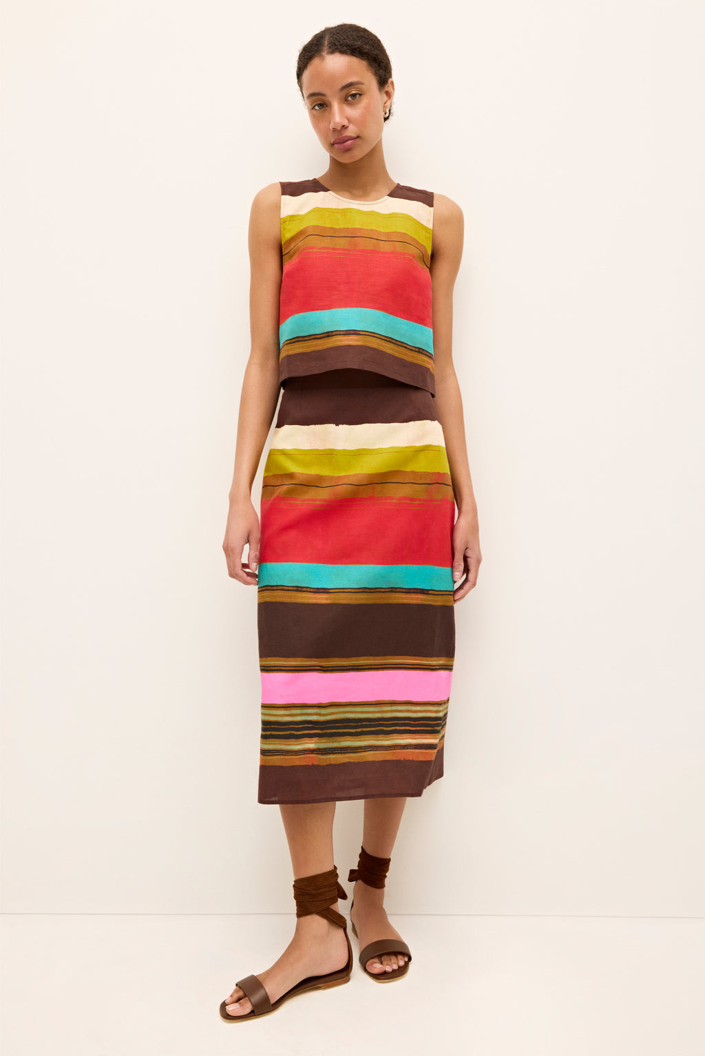 Midi pencil skirt with bold horizontal stripes in vibrant, earthy tones 