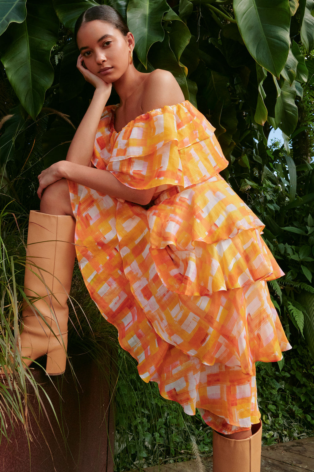Maxi skirt with ruffled tiers in an orange and yellow plaid print