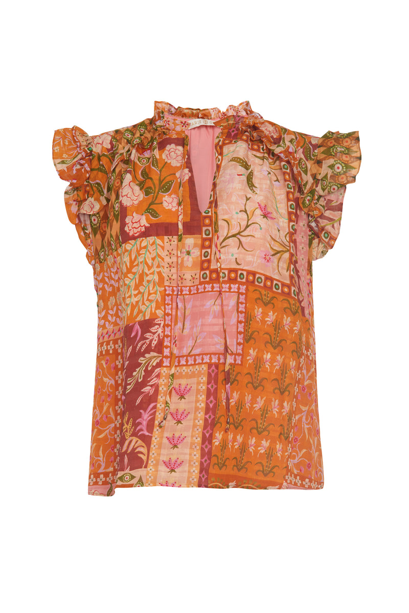 Top with a v-neckline and ruffle detailing around the neckline in an orange floral patchwork print 