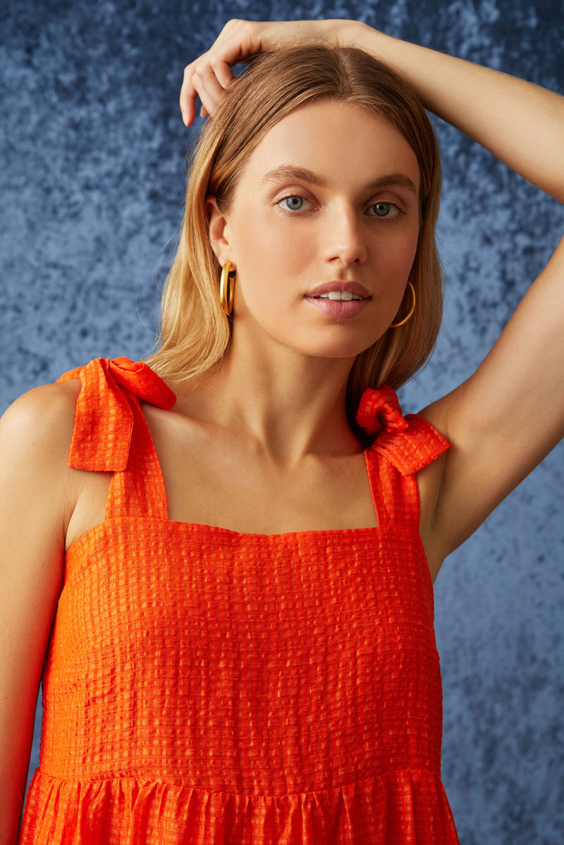 Maxi dress with thick straps that tie at the top of the shoulder