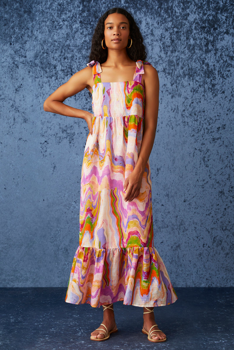 Flowy maxi dress with thick straps that tie at the shoulder in marble like pastel print