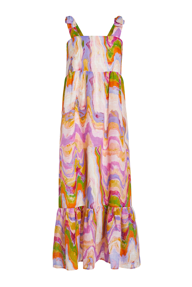 Flowy maxi dress with thick straps that tie at the shoulder in a pink pastel marble print