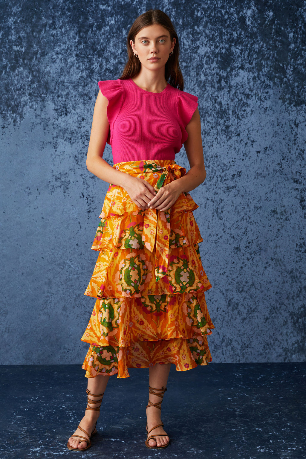 Long maxi skirt with a side zipper and sash tie belt around the waist 
