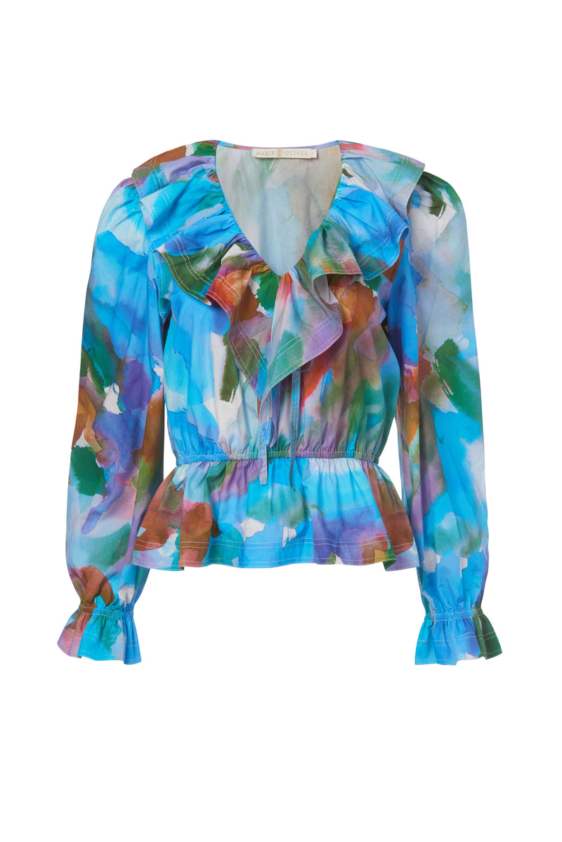 Peplum top with large ruffle v-neckline in a blue watercolor printed color