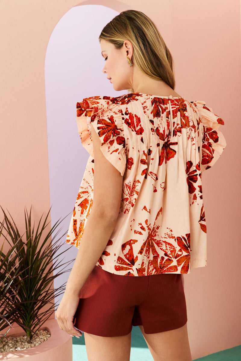 flutter short sleeve blouse with top-stitching detailing at the front of the blouse and a button at the back of the neckline 