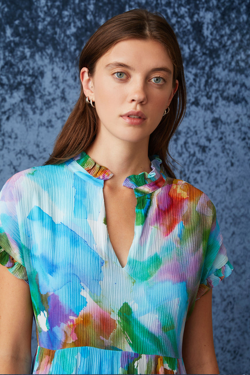 Four tiered maxi dress with short sleeves and delicate ruffles at the end of the sleeves