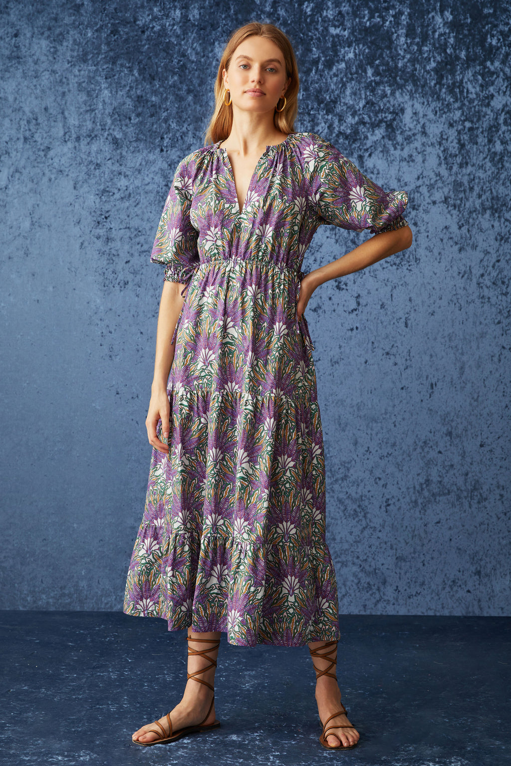 Lime green floral midi dress with adjustable v-neckline and tiered skirt 