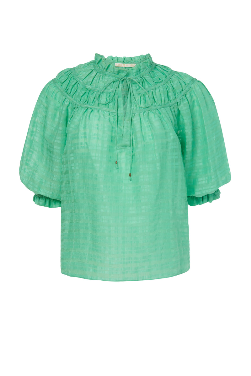 Top with an adjustable v-neckline and pleats around the collar 