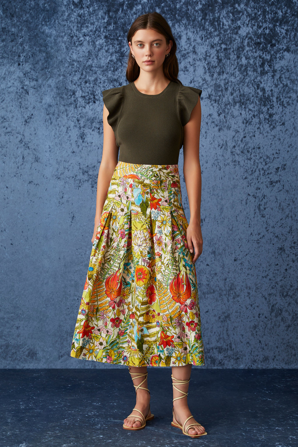 Large floral printed maxi skirt that sits at the high waistline with a side zip closure 