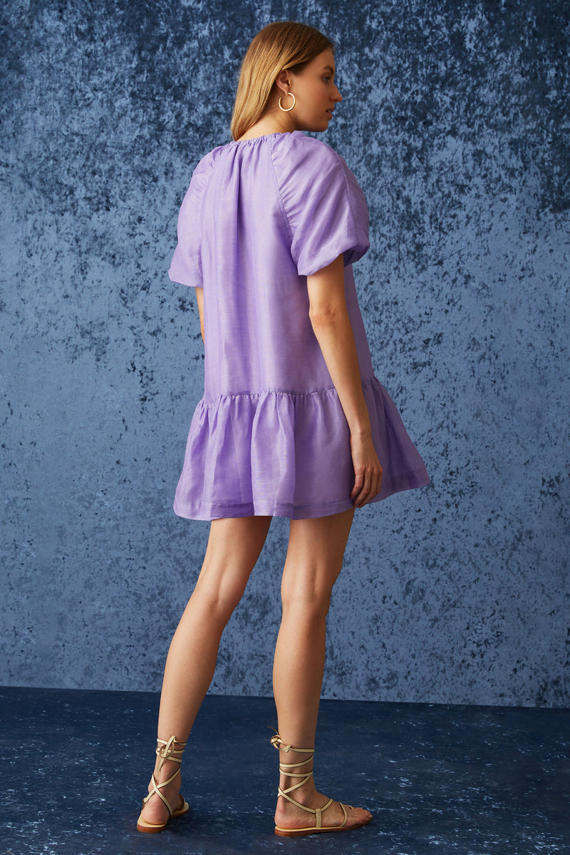 Mini dress in a bright orange print with a flowy slip on silhouette 
