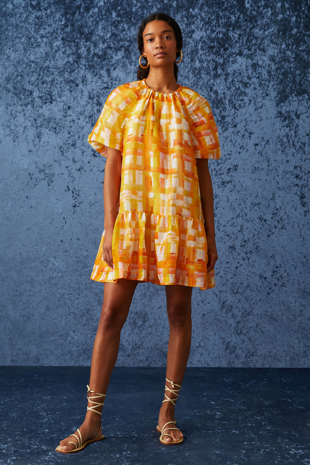 Orange and yellow checkered printed short dress with short puff sleeves