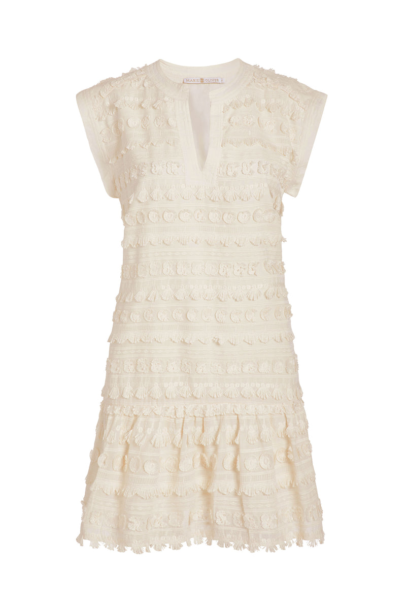Short sleeves mini dress in a solid white color with tassels forming the pattern 