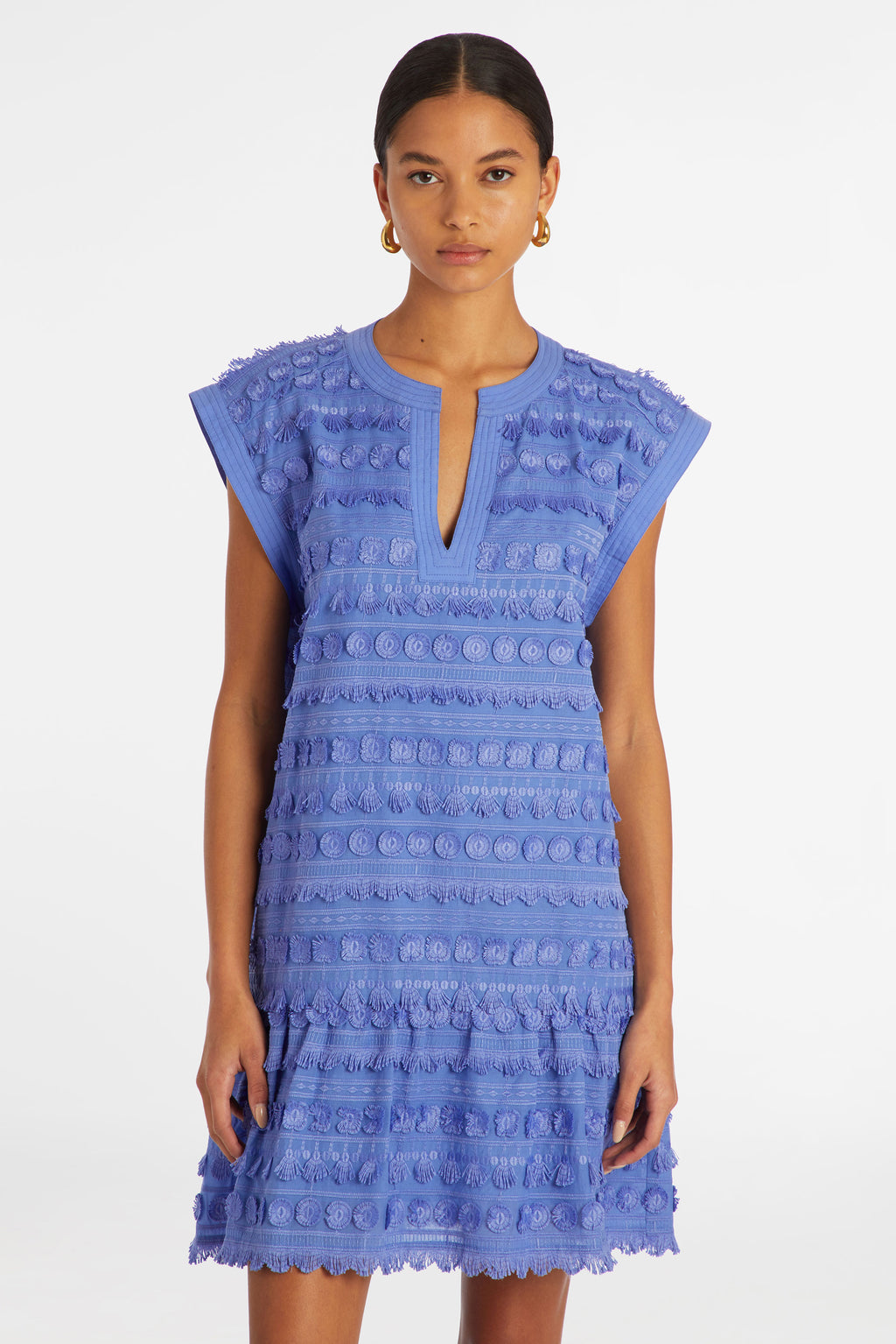 Solid blue short dress with short tassels to form the pattern 