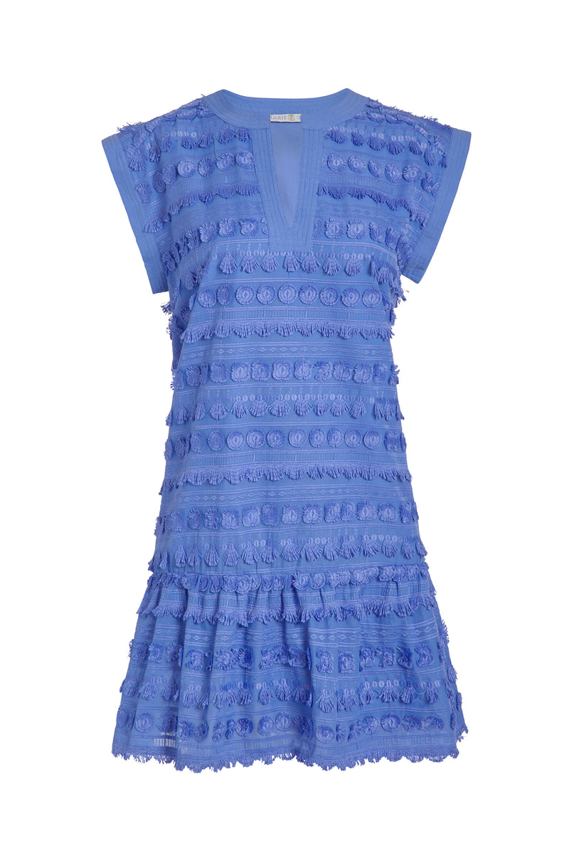 Short sleeves mini dress in a solid blue color with tassels forming the pattern 