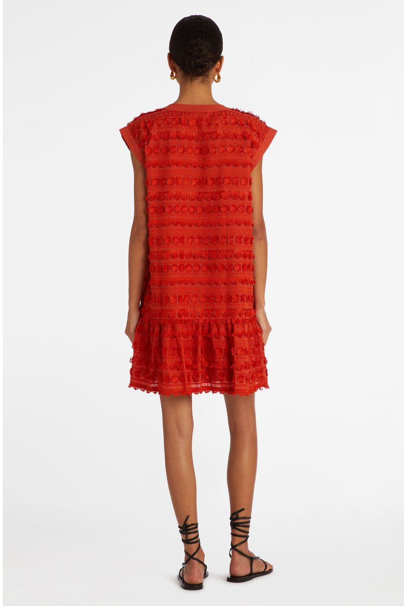 Short sleeves mini dress in a solid dark red color with tassels forming the pattern 