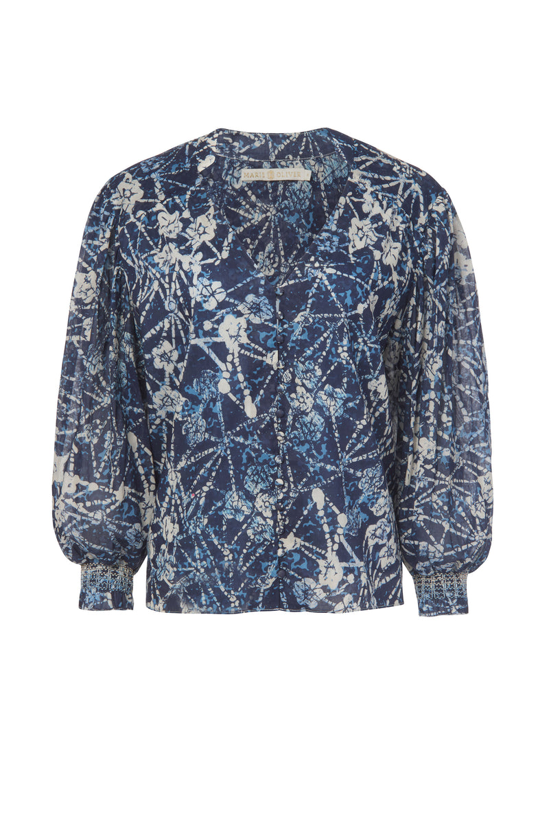 Dark blue floral printed blouse with long, cuffed sleeves