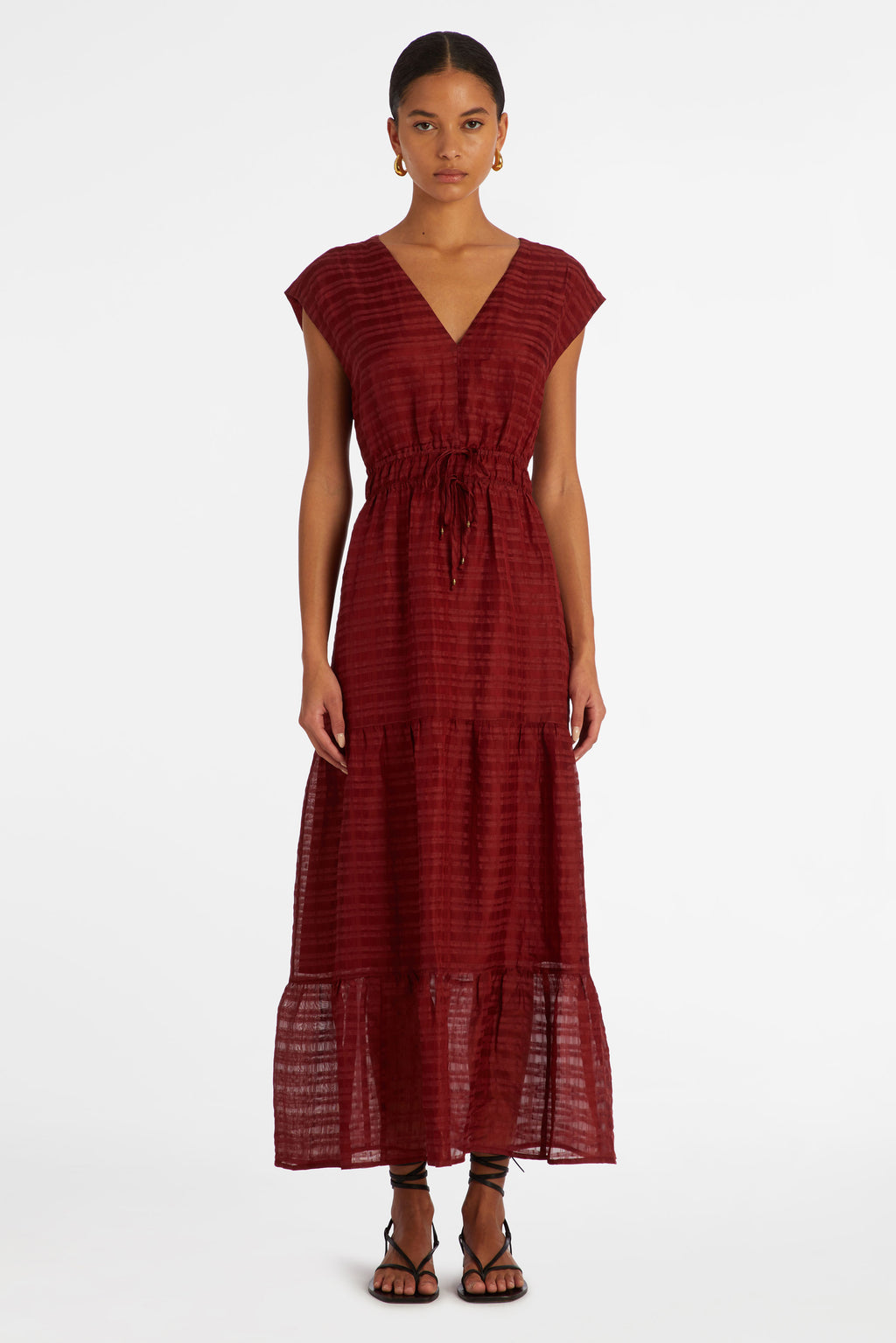 maxi dress in a dark red solid color with texture in the material 