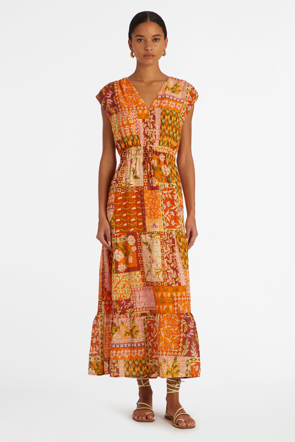 maxi dress in a orange floral patchwork print with texture in the material 