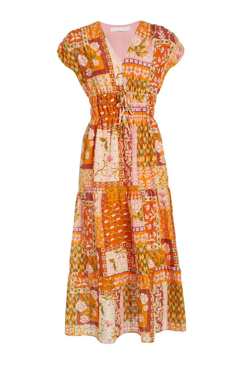 Long dress with short sleeves and a v-neckline in an orange floral patchwork print
