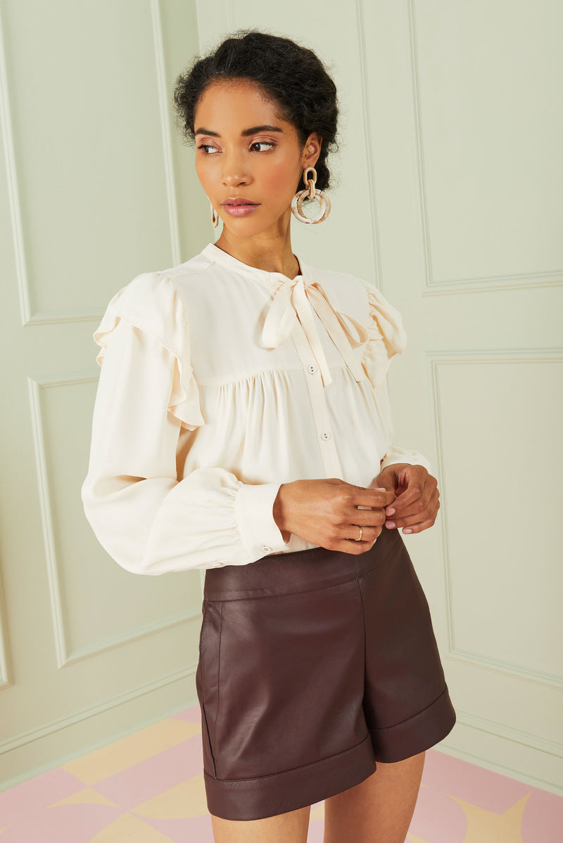long sleeve feminine blouse in soft pink