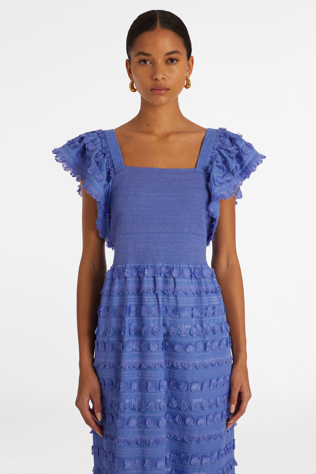Maxi dress that has short flutter sleeves and a smocked bodice