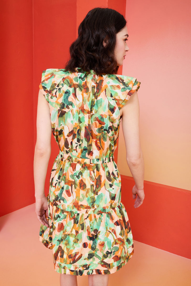 Green, orange and brown water color printed v-neck dress with a brown braided belt with tassles 