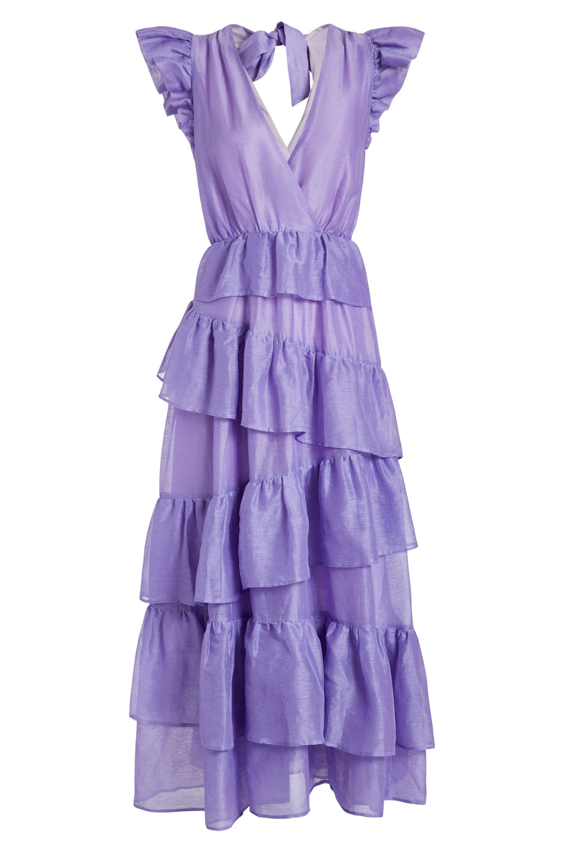 Long maxi dress that has an open back with an adjustable tie at the shoulders