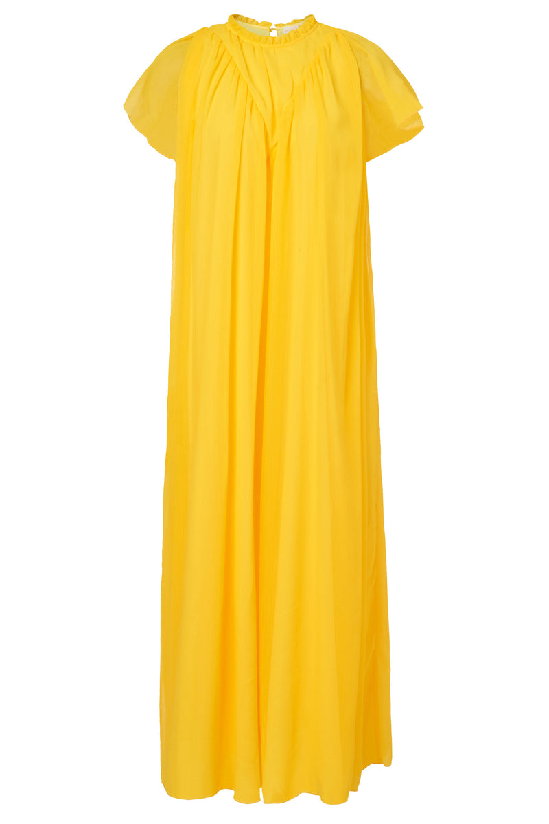 Long maxi dress with rounded ruffle neckline and button closure at the back of the neck 