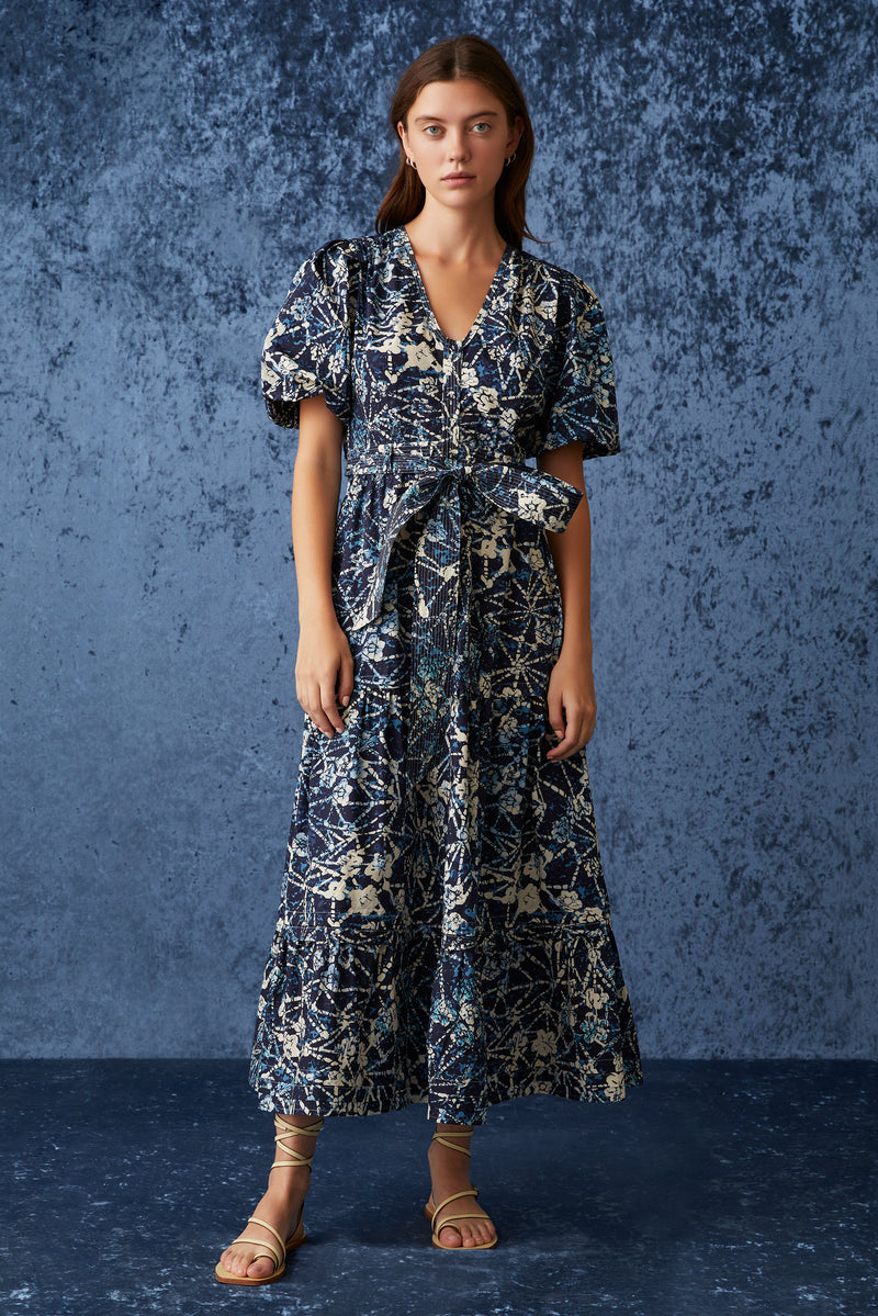 Dark blue and white floral maxi dress with v-neck and short puff sleeves