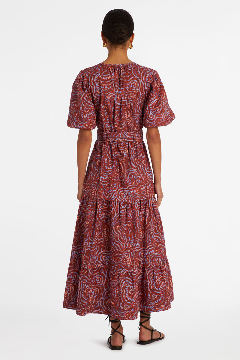 Long dress with wrap silhouette that is belted at the waist