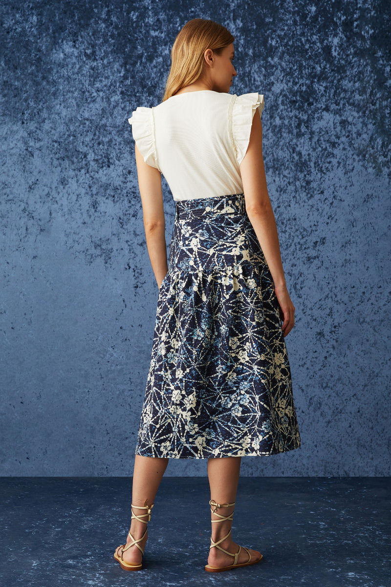 Dark blue and white floral skirt with optional tie belt at the waist and straight silhouette