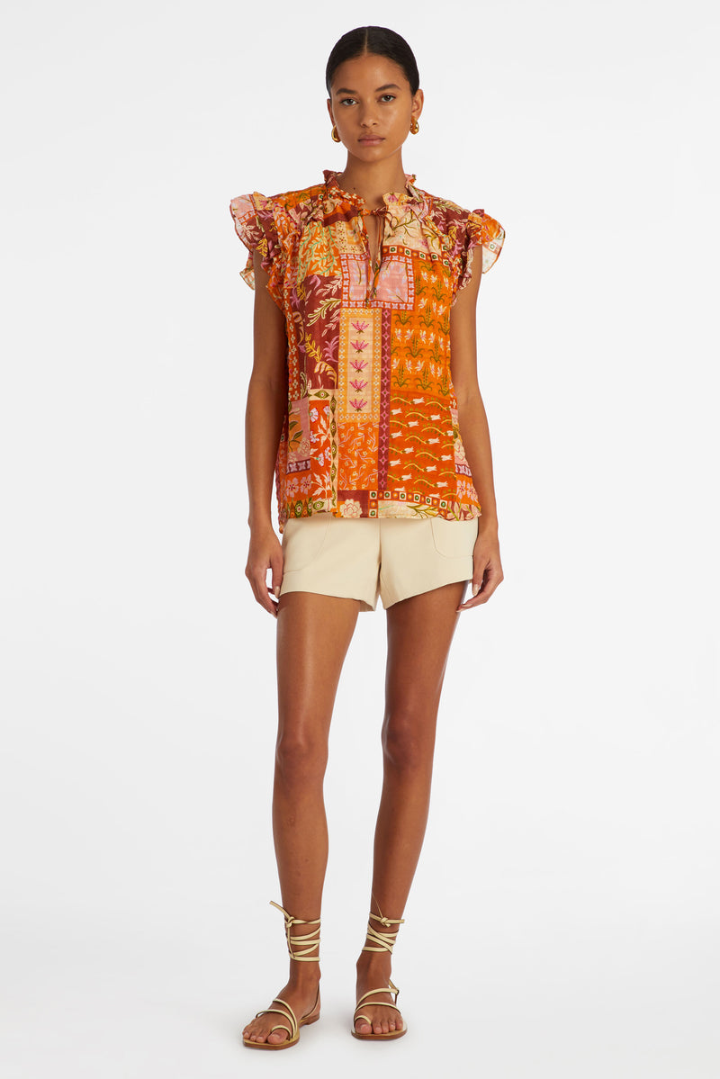 Orange floral patchwork printed  top with a straight silhouette and flutter sleeves