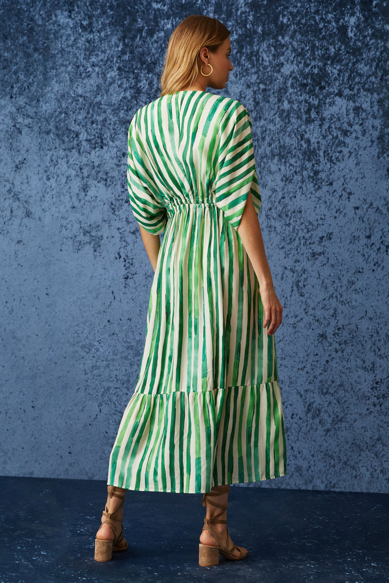 Long flowy midi dress that has a v-neckline in a green and white vertical stripe 