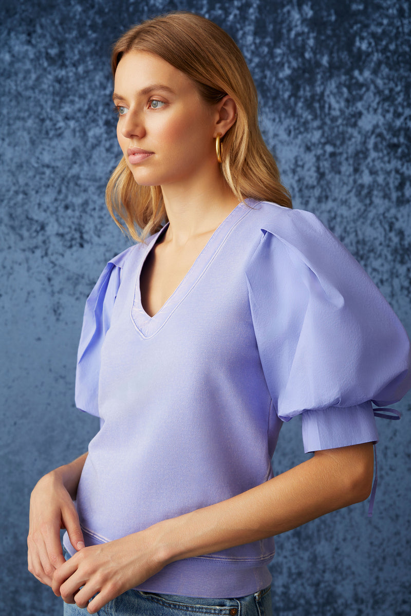 Purple short sleeve top with a straight silhouette