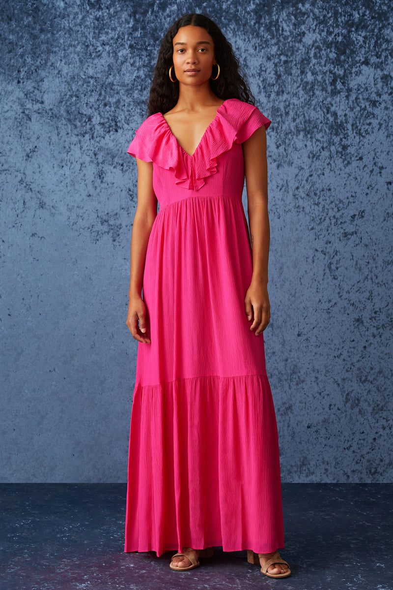 Bright pink solid maxi dress with ruffled v-neckline