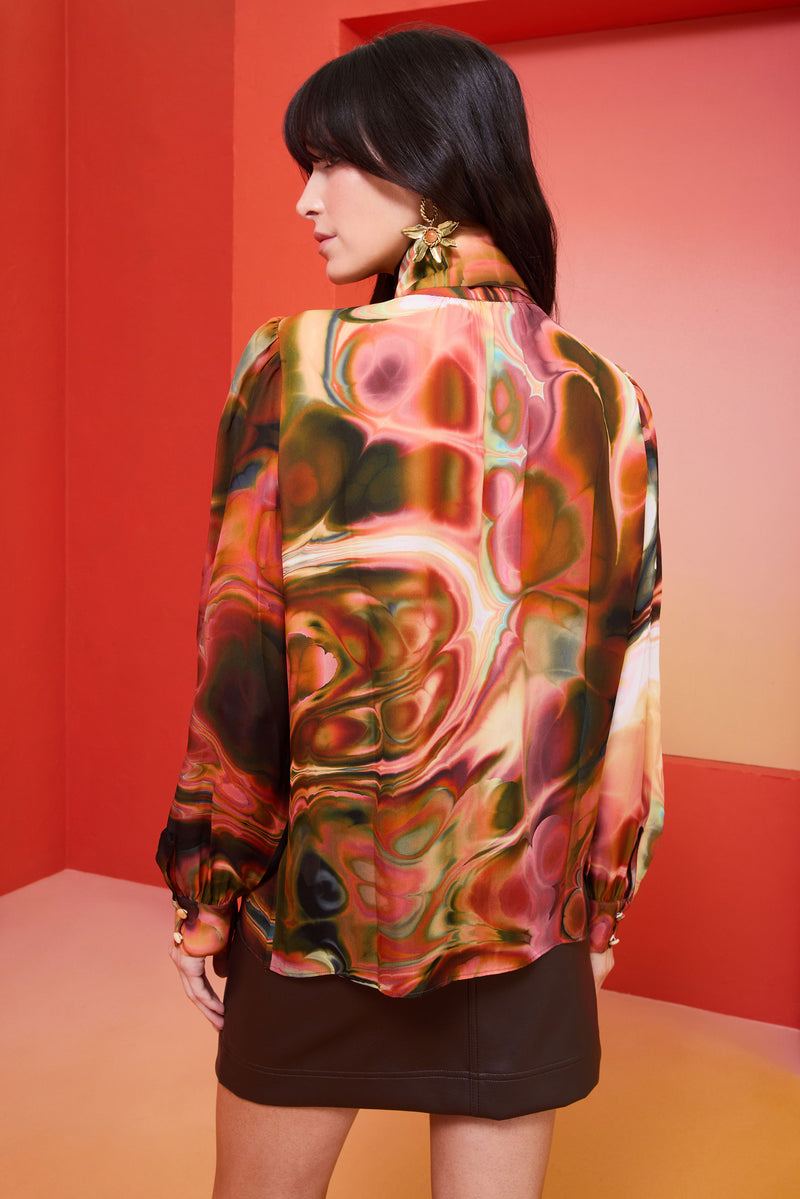 long sleeve blouse that has an optional tie neck sash 